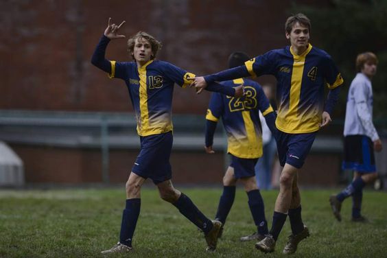 Western Pennsylvania School for the Deaf soccer player, Kyle D'Amore (left) signs to his coaches as fellow player, Chad D'Amore stands by during the third round of the Second Annual Eastern School for the Deaf Athletic Association soccer tournament.