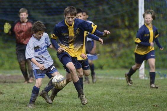Western Pennsylvania School for the Deaf soccer player, Chad D'Amore fights for the ball against Slavic Sukhostev of Marie Phillip School during the third round of the Second Annual Eastern School for the Deaf Athletic Association soccer tournament.