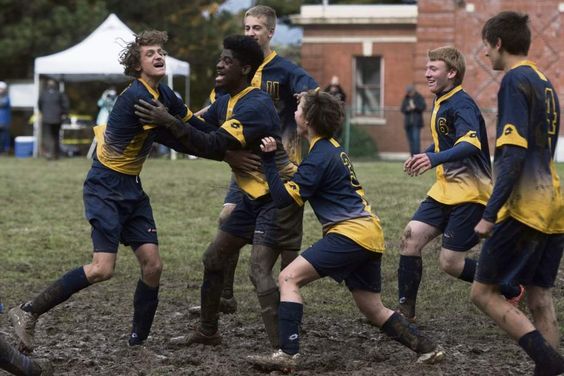 layers from the Western Pennsylvania School for the Deaf celebrate after winning the third round of the Second Annual Eastern School for the Deaf Athletic Association soccer tournament.